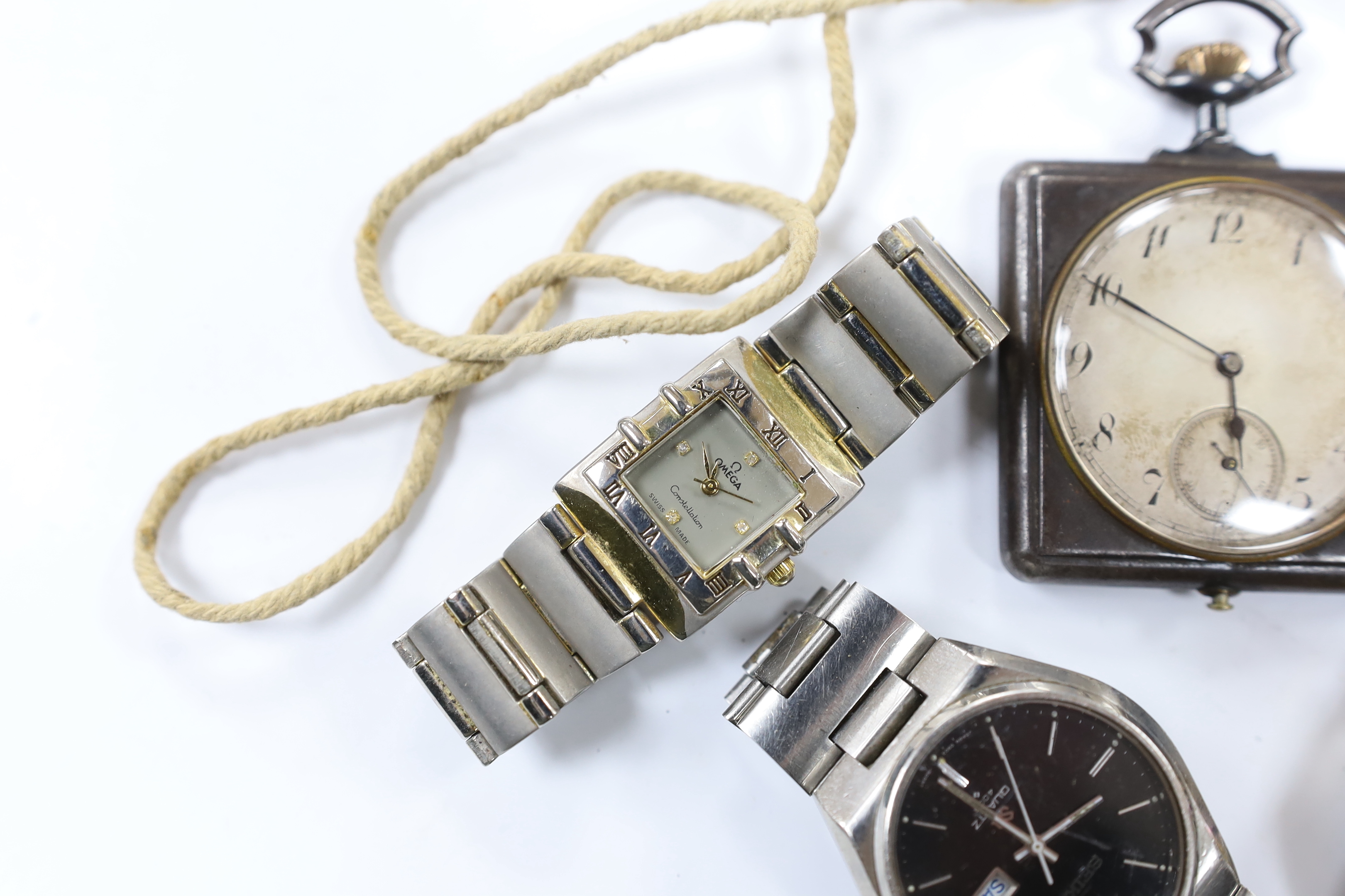 Six assorted gentleman's wrist watches including a Seiko Diashock automatic, two other Seiko watches and a sterling Rotary watch, together with a gun metal travelling timepiece and a 'Yachtsman' stop watch.